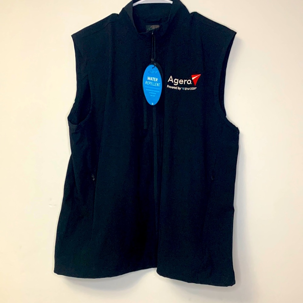 Greg Norman water repellent black vest new with tags. Size Large. Color- black